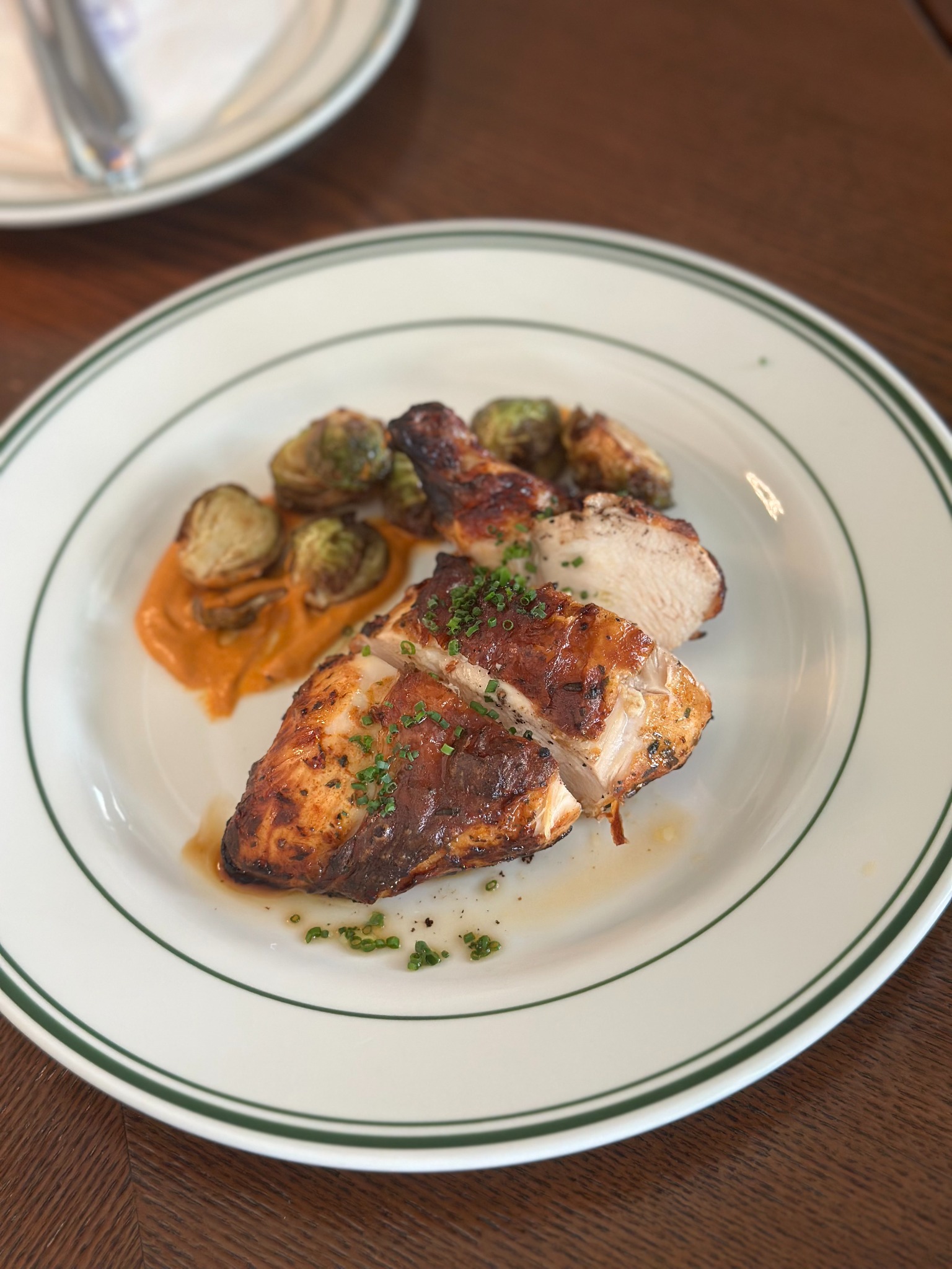 A plated chicken dish from Ven’s table